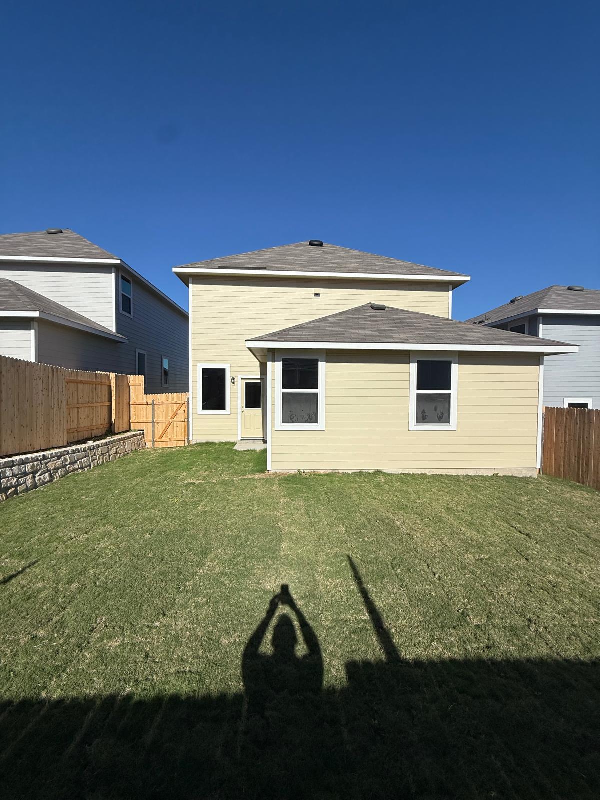 2709 Towy Road Pflugerville, TX 78660 - Photo 6 of 38 Back of house with a fenced backyard