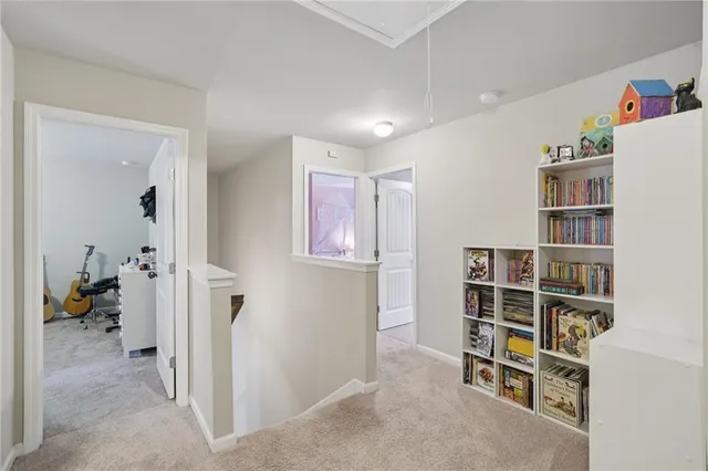 a view of a livingroom with a bookshelf