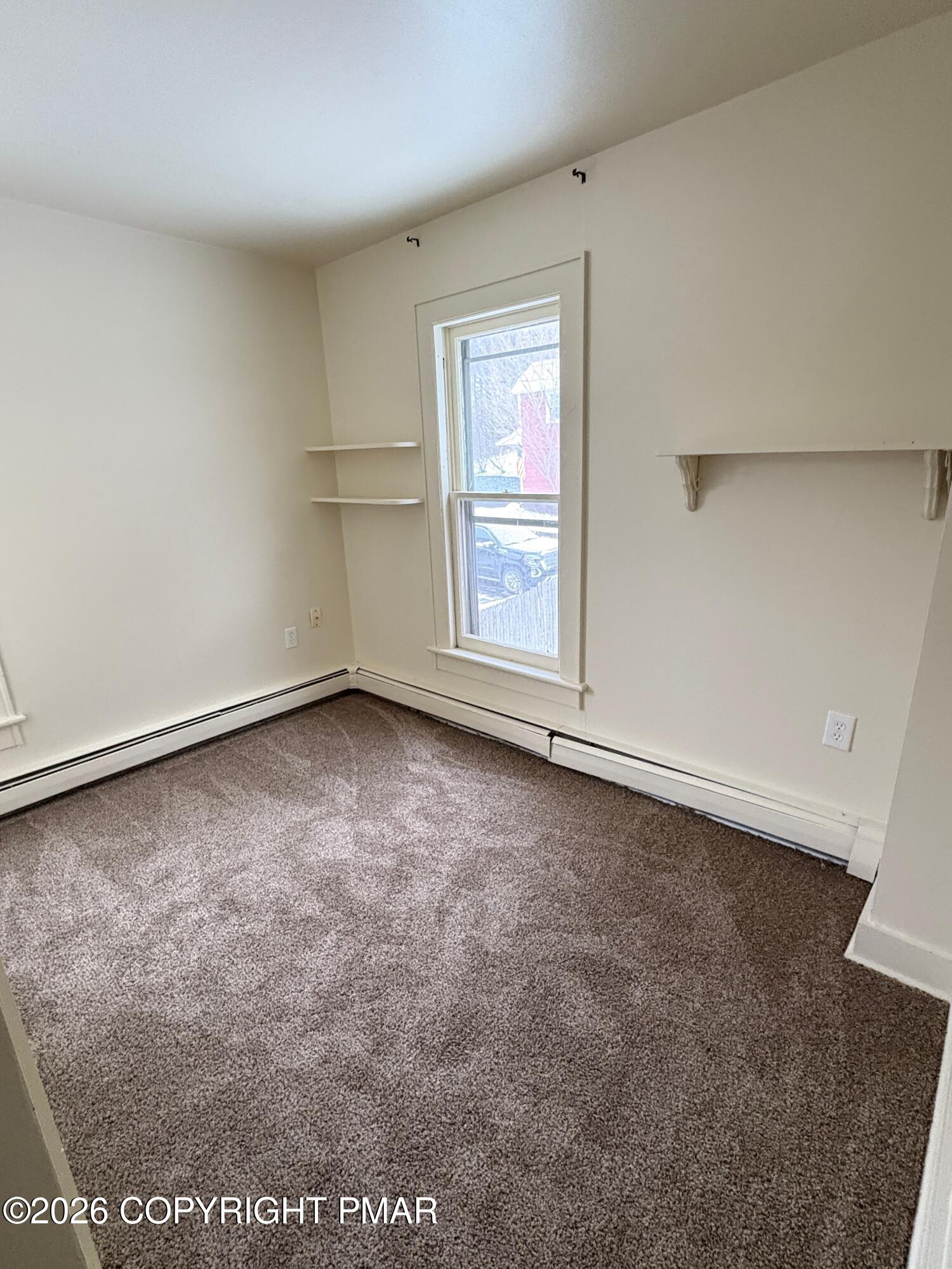 622 Scott Street Stroudsburg, PA 18360 - Photo 8 of 14 an empty room with a workbench