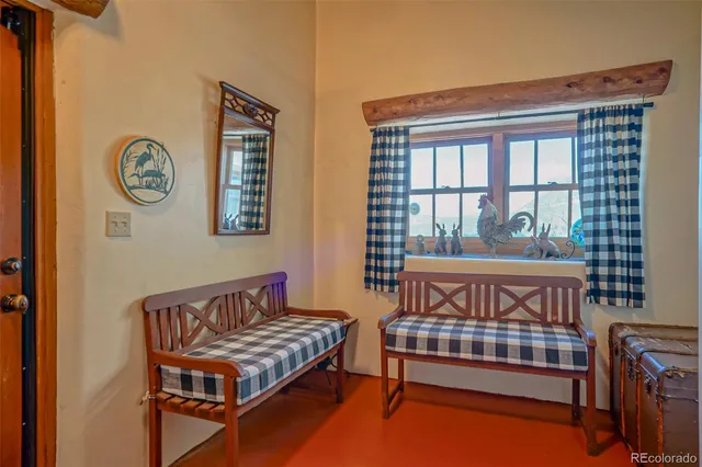 a view of a wooden floor and a big yard