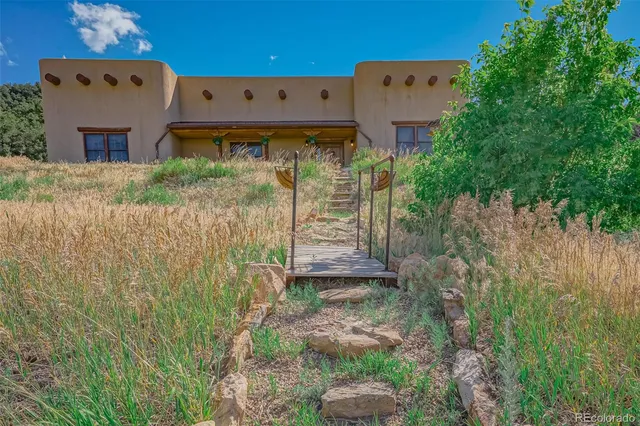 a view of a garage with chairs