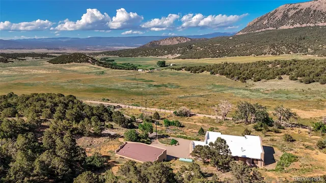 a picture of a bathroom with a shower