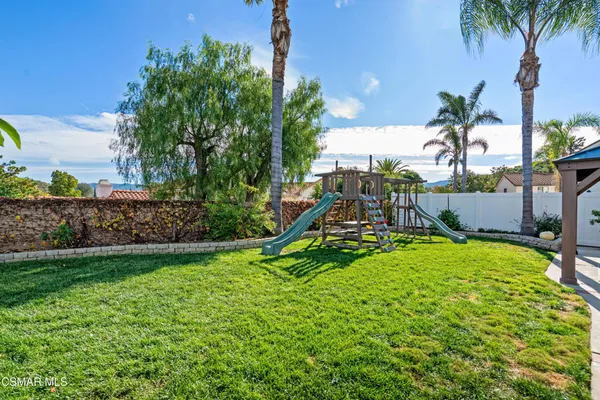 a view of a garden with a slide