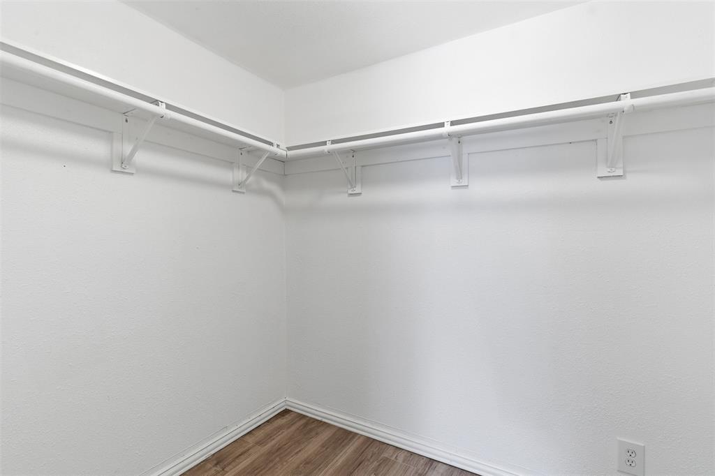 405 North Carr Avenue Sherman, TX 75090 - Photo 15 of 22 a view of a room with racks on the wall