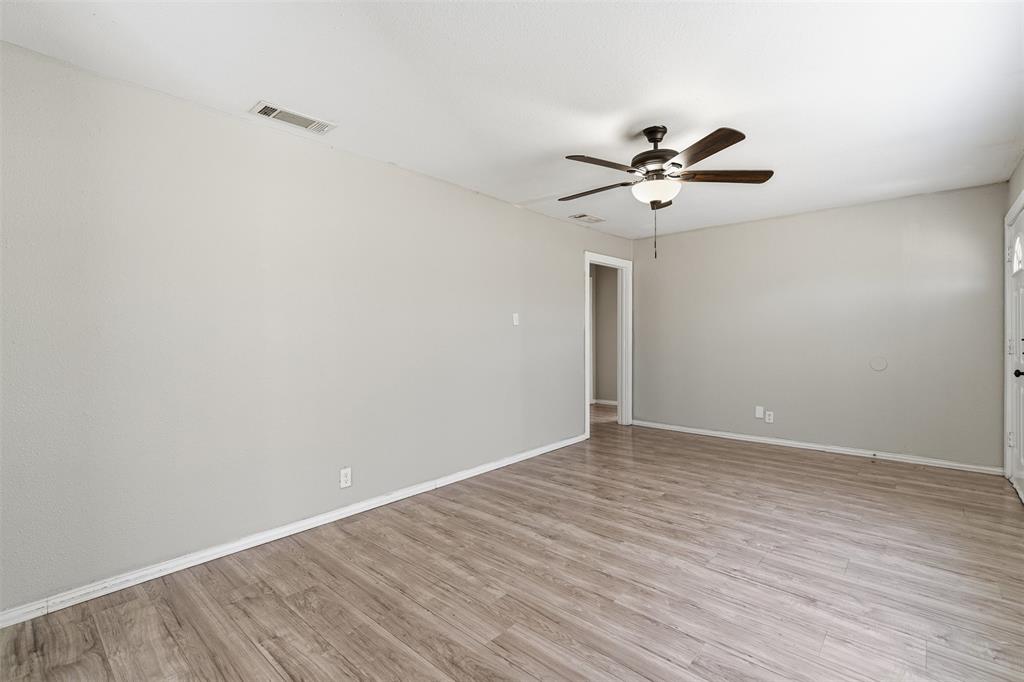 405 North Carr Avenue Sherman, TX 75090 - Photo 8 of 22 wooden floor in an empty room