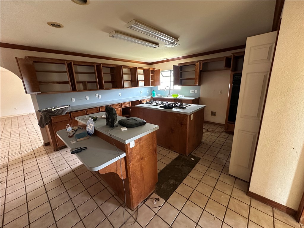417 Linnet Courts Corpus Christi, TX 78418 - Photo 8 of 20 a room with storage and utility