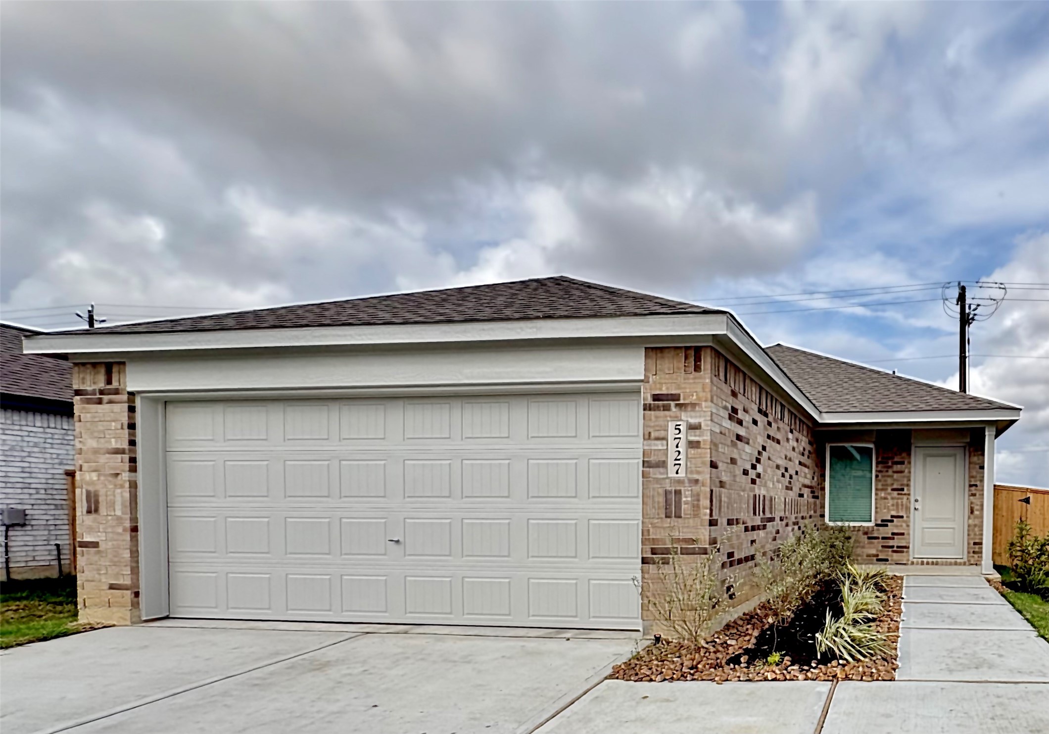 5727 Little Redwing Drive Baytown, TX 77521 - Photo 2 of 25 a front view of a house