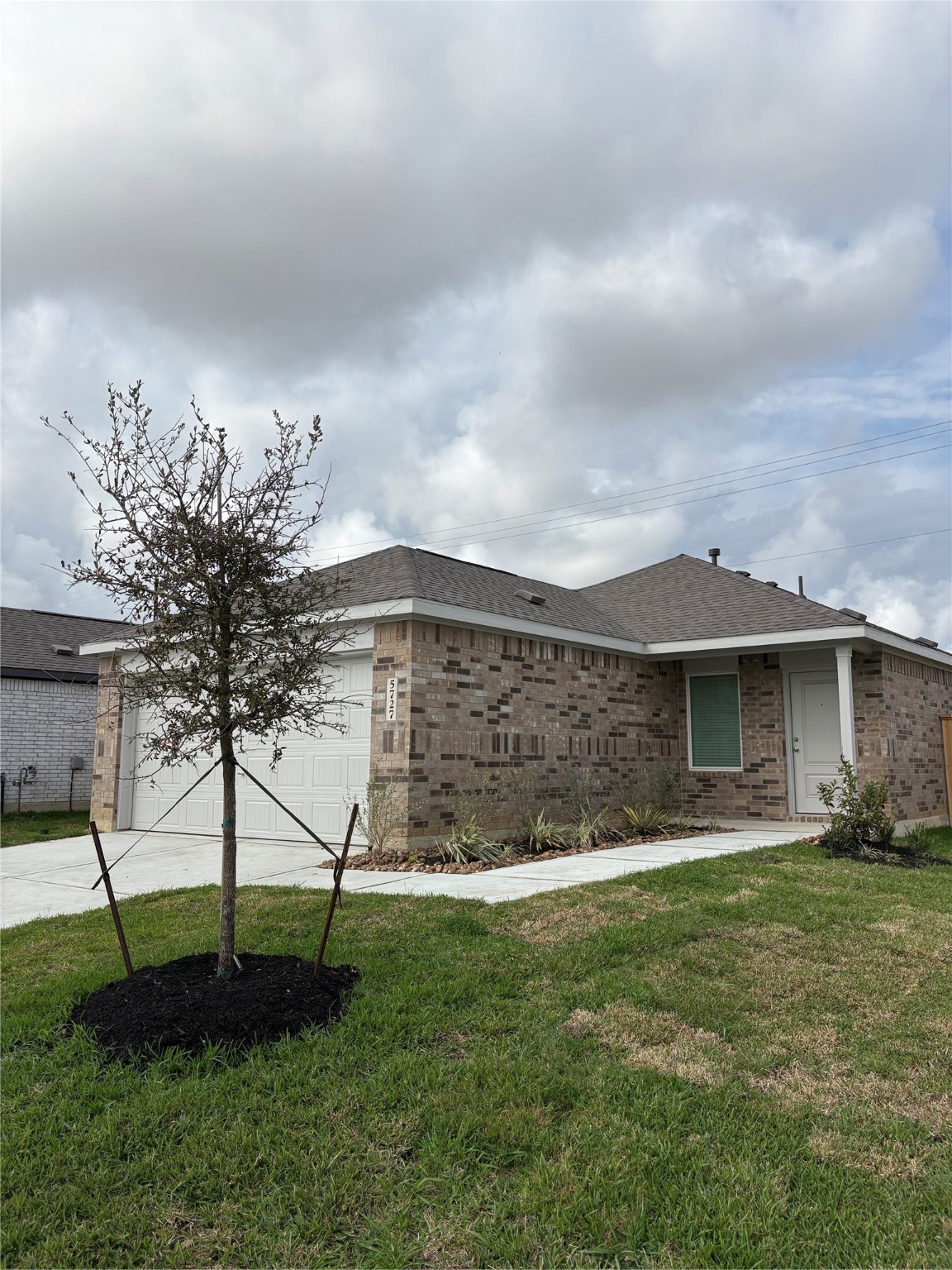 5727 Little Redwing Drive Baytown, TX 77521 - Photo 22 of 25 a view of a house with a yard