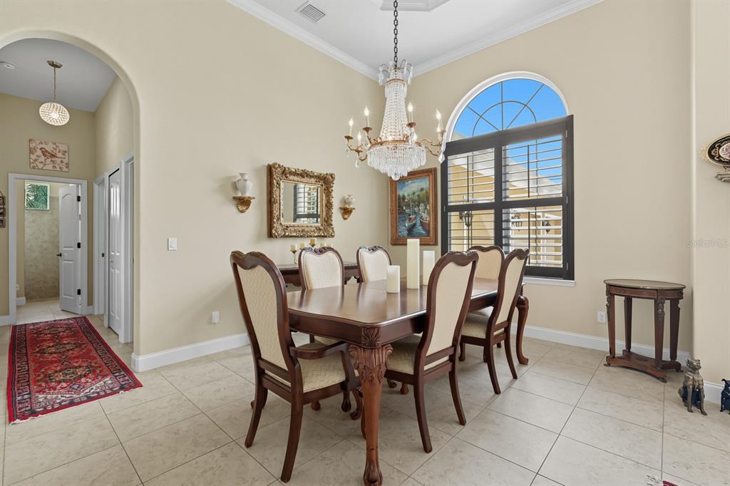 430 Lambert Avenue Flagler Beach, FL 32136 - Photo 19 of 63 a view of a dining room with furniture