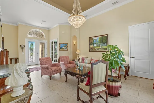 a bathroom with a granite countertop tub sink and mirror