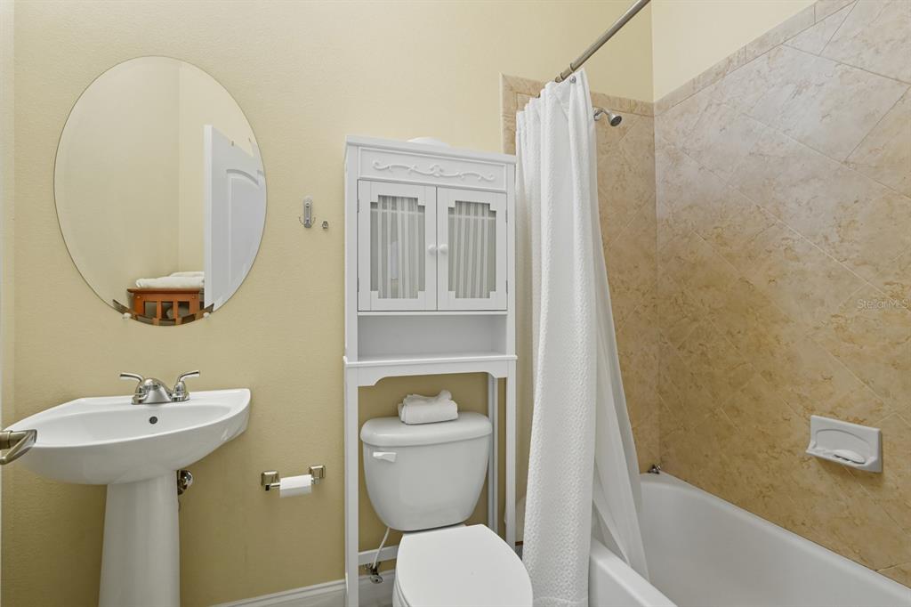 430 Lambert Avenue Flagler Beach, FL 32136 - Photo 41 of 63 a bathroom with a sink a toilet and shower