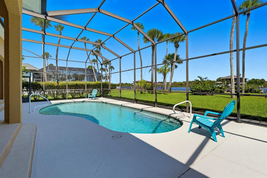 430 Lambert Avenue Flagler Beach, FL 32136 - Photo 49 of 63 a view of yard with swimming pool and outdoor seating