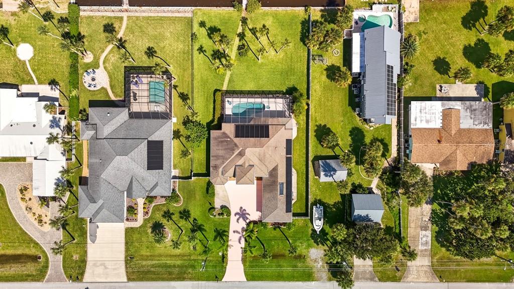 430 Lambert Avenue Flagler Beach, FL 32136 - Photo 62 of 63 an aerial view of residential houses with outdoor space