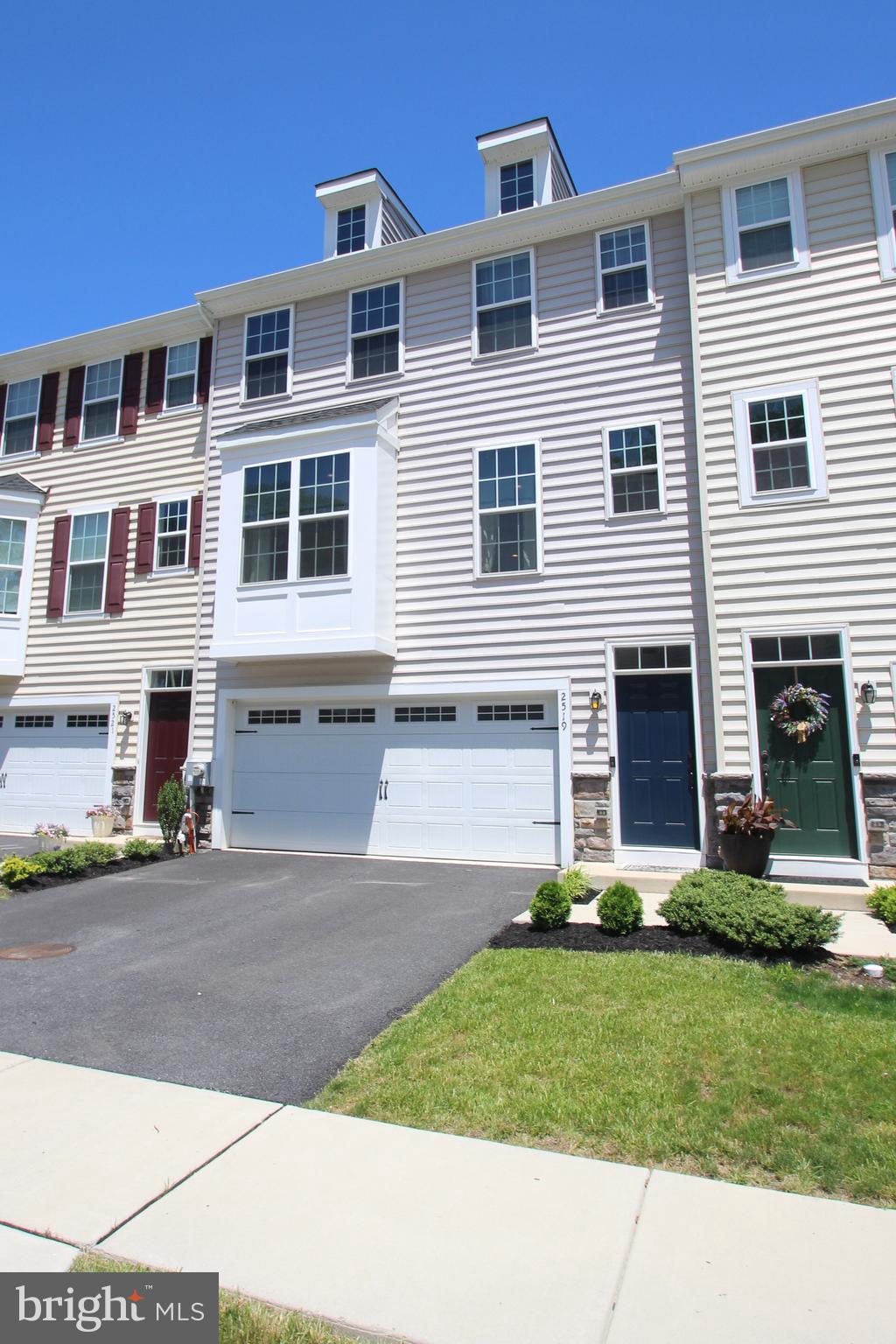 2519 Marvine Avenue Drexel Hill, PA 19026 - Photo 1 of 27 a front view of a house with a yard and garage