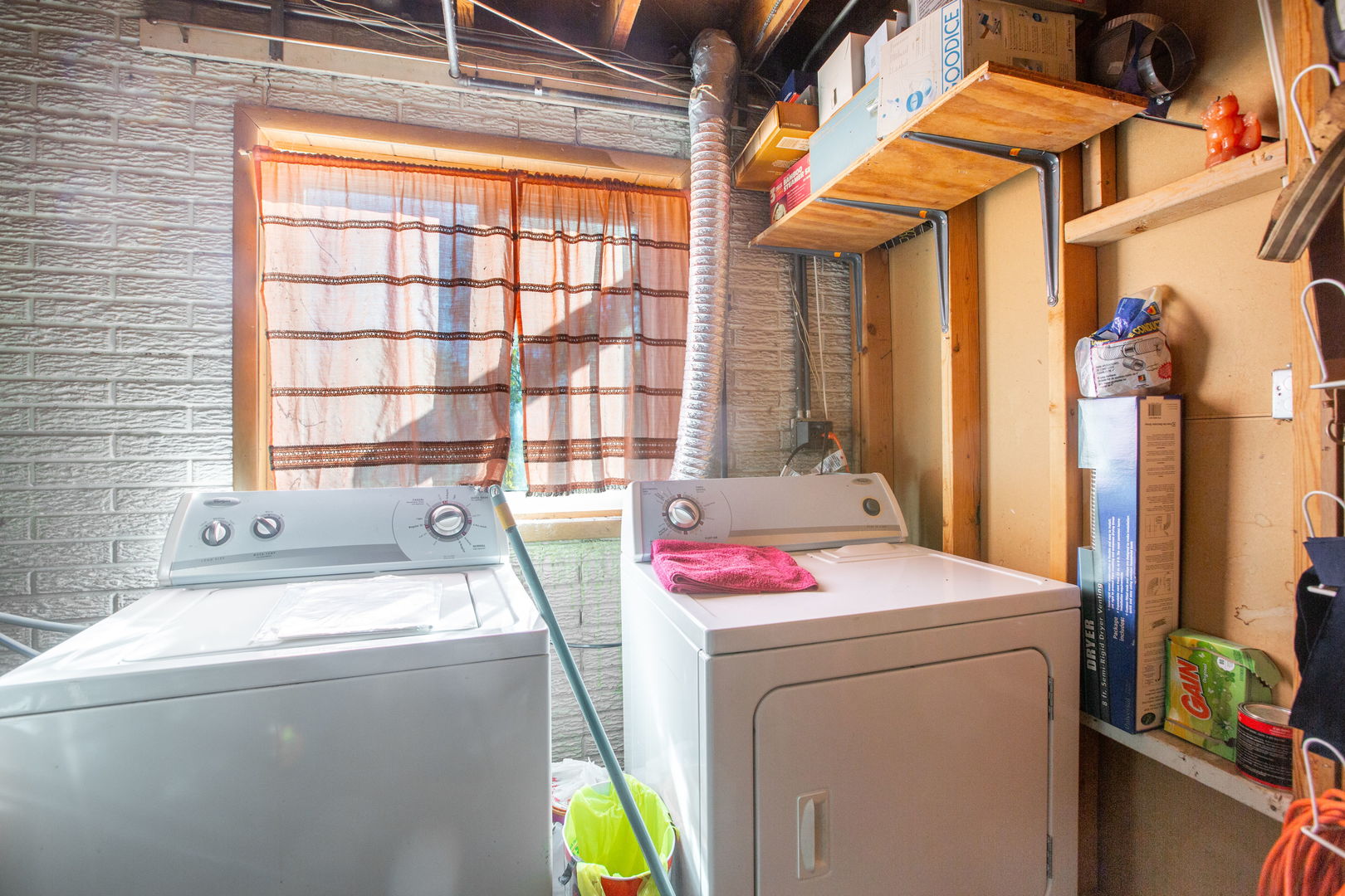 669 White Pine Road Buffalo Grove, IL 60089 - Photo 14 of 16 a utility room with dryer and washer