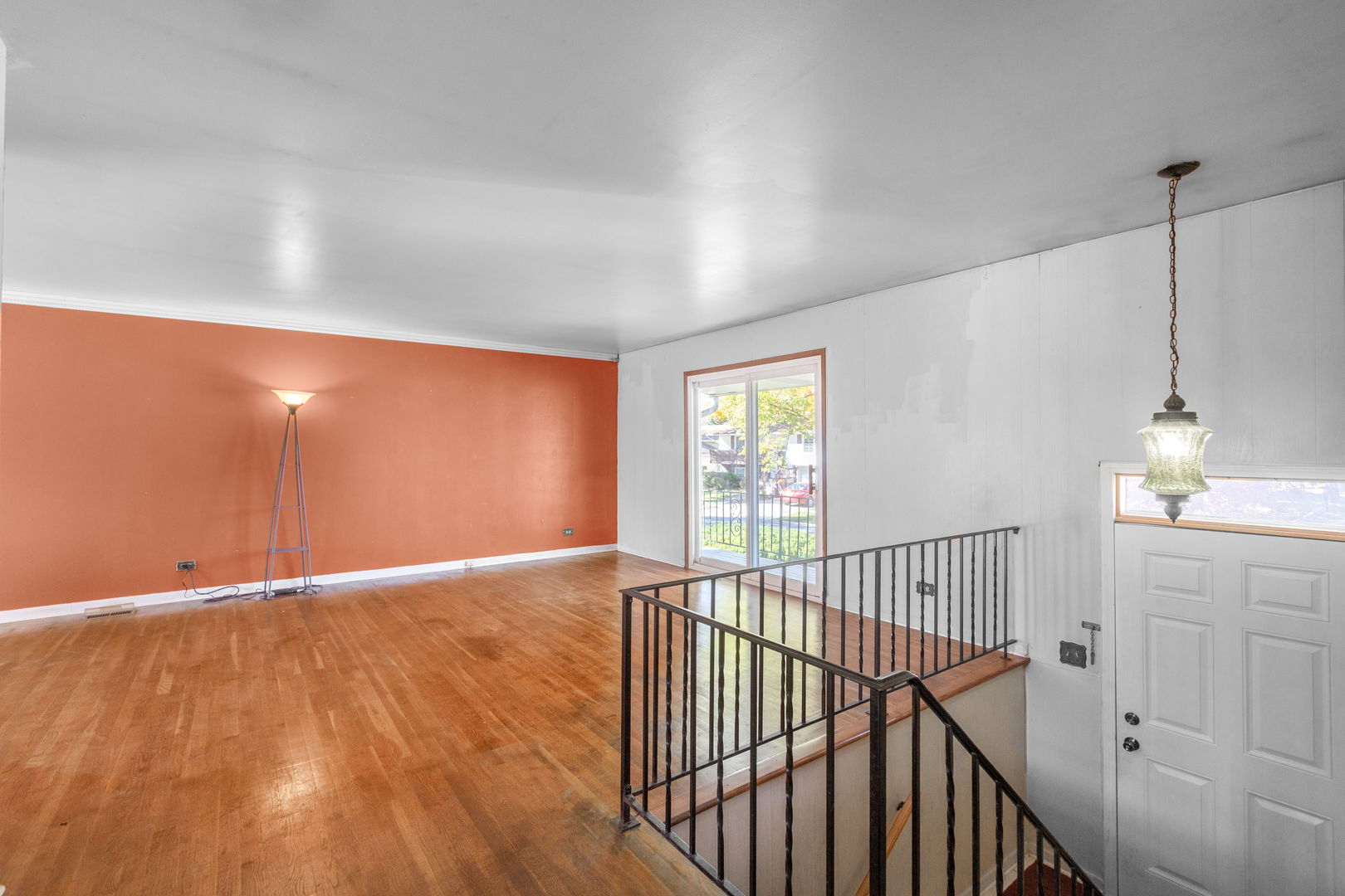 669 White Pine Road Buffalo Grove, IL 60089 - Photo 2 of 16 a view of an empty room with wooden floor