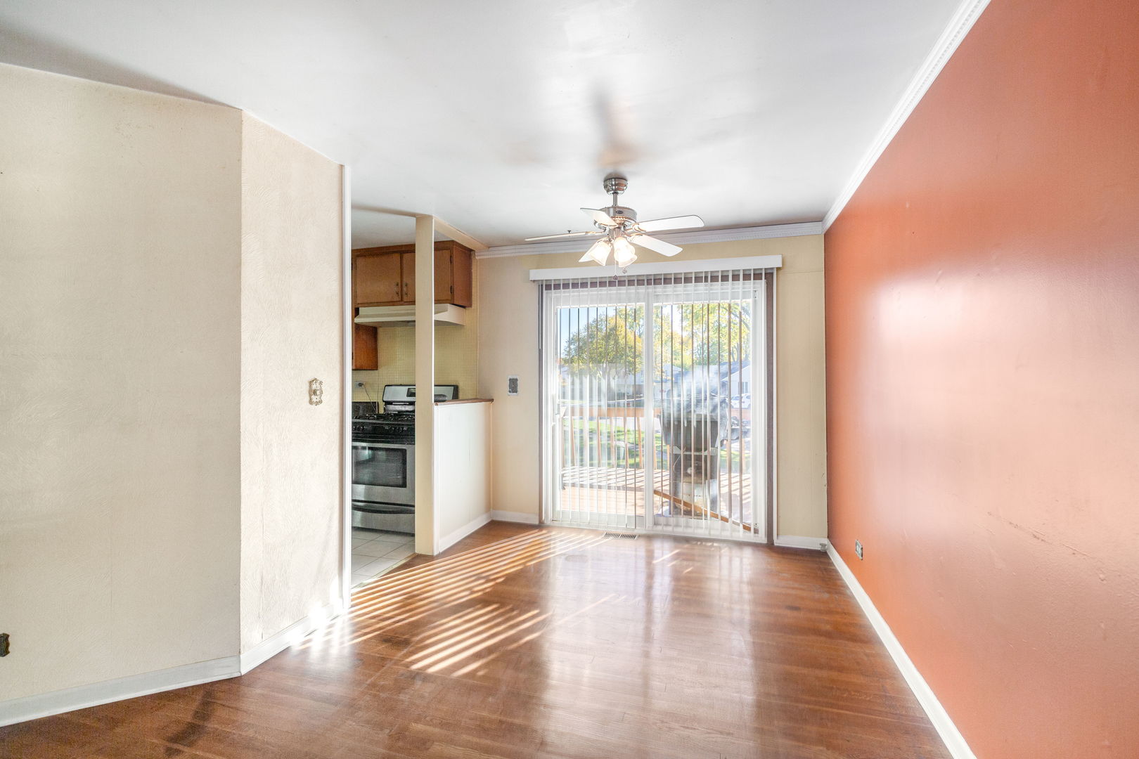 669 White Pine Road Buffalo Grove, IL 60089 - Photo 5 of 16 wooden floor in an empty room with a window