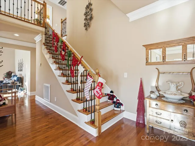 a view of entryway with wooden floor