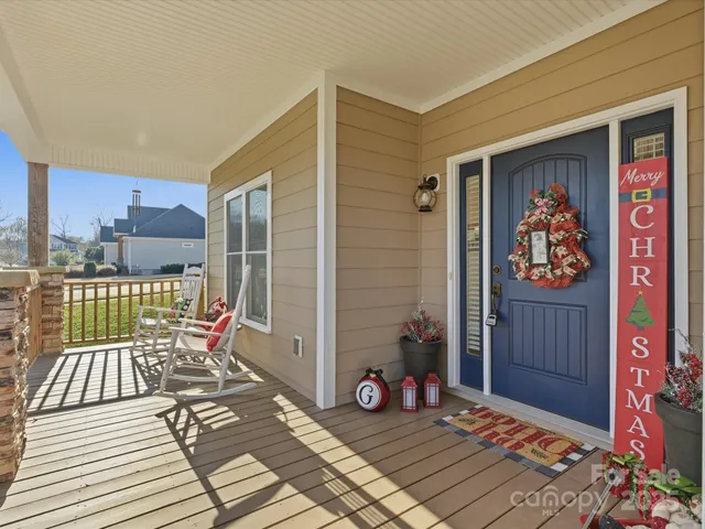 a view of a balcony with wooden floor