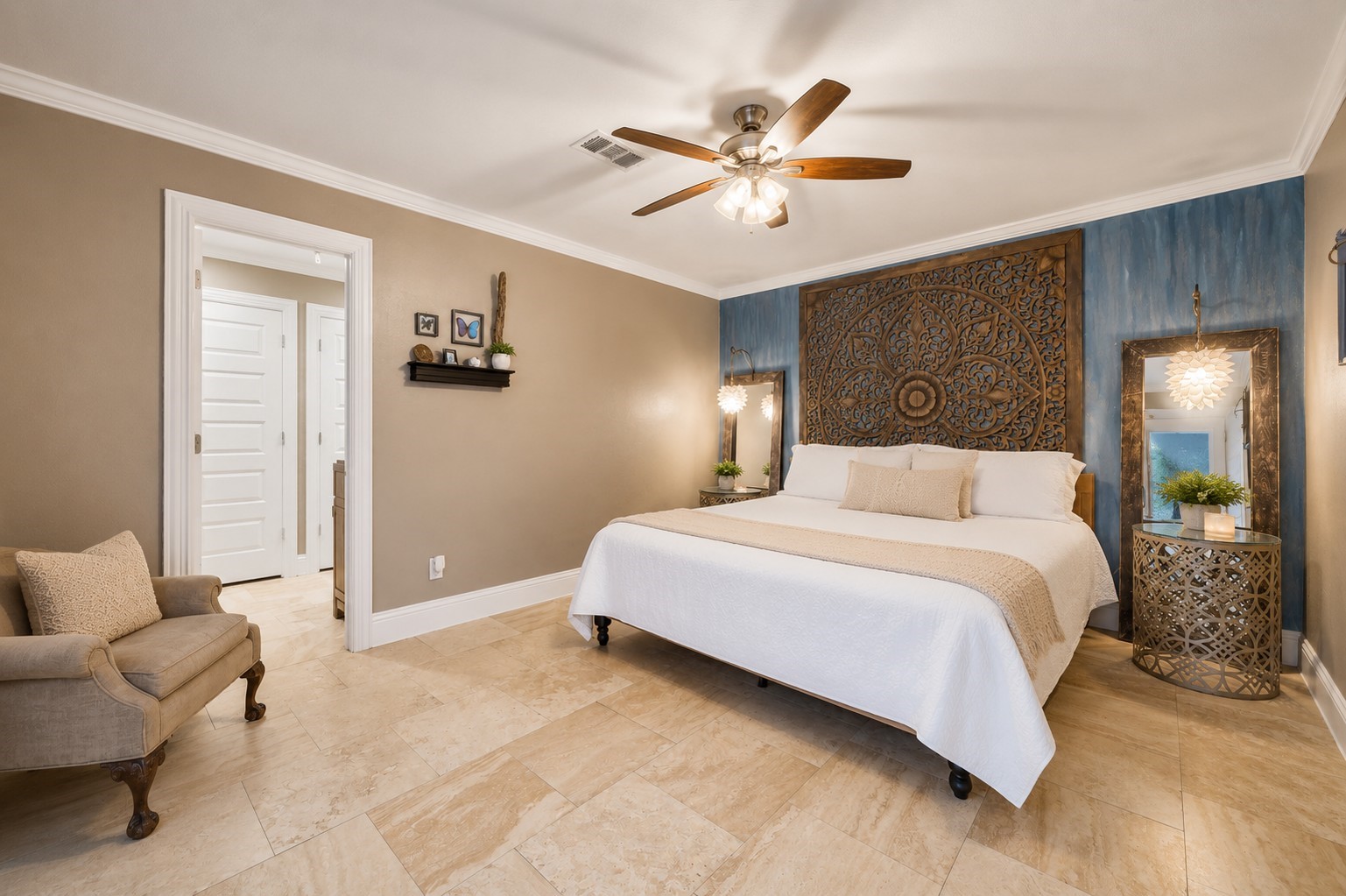 5 Tree Frog Drive Houston, TX 77074 - Photo 9 of 25 a bedroom with a bed and a chandelier
