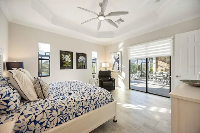 a bedroom with bed and a window