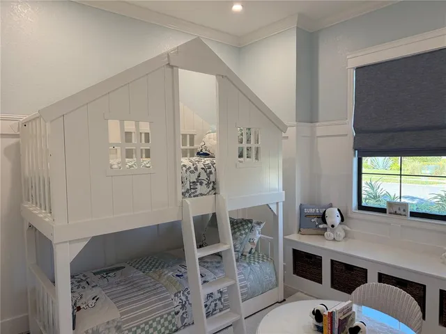 an aerial view of multiple houses with yard