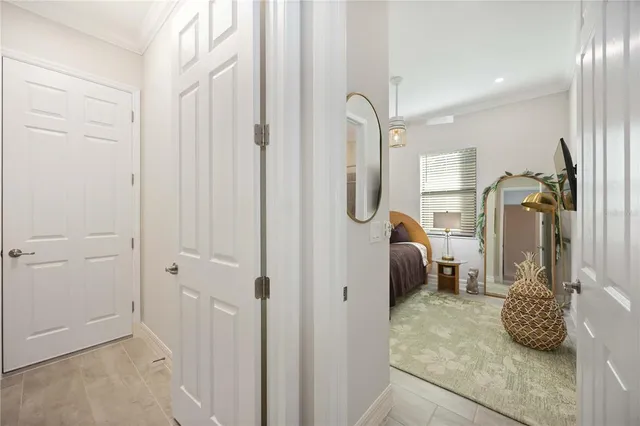 an aerial view of a house with a yard and potted plants