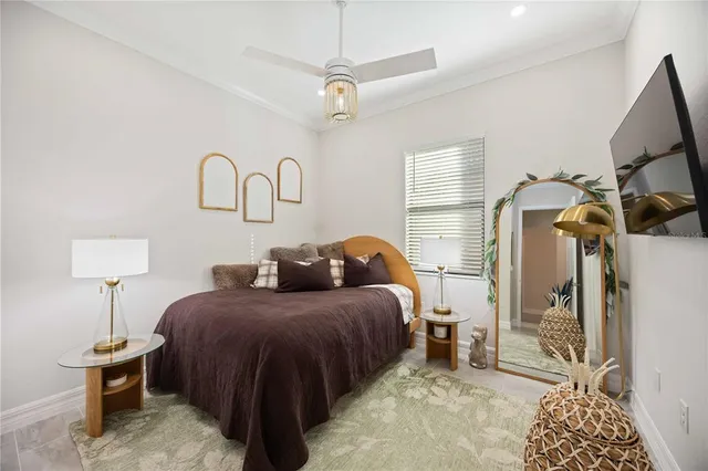 an aerial view of residential houses with outdoor space and ocean view