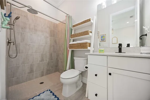 an aerial view of a house with a lake view