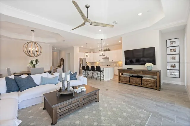 a view of a hallway and dining room
