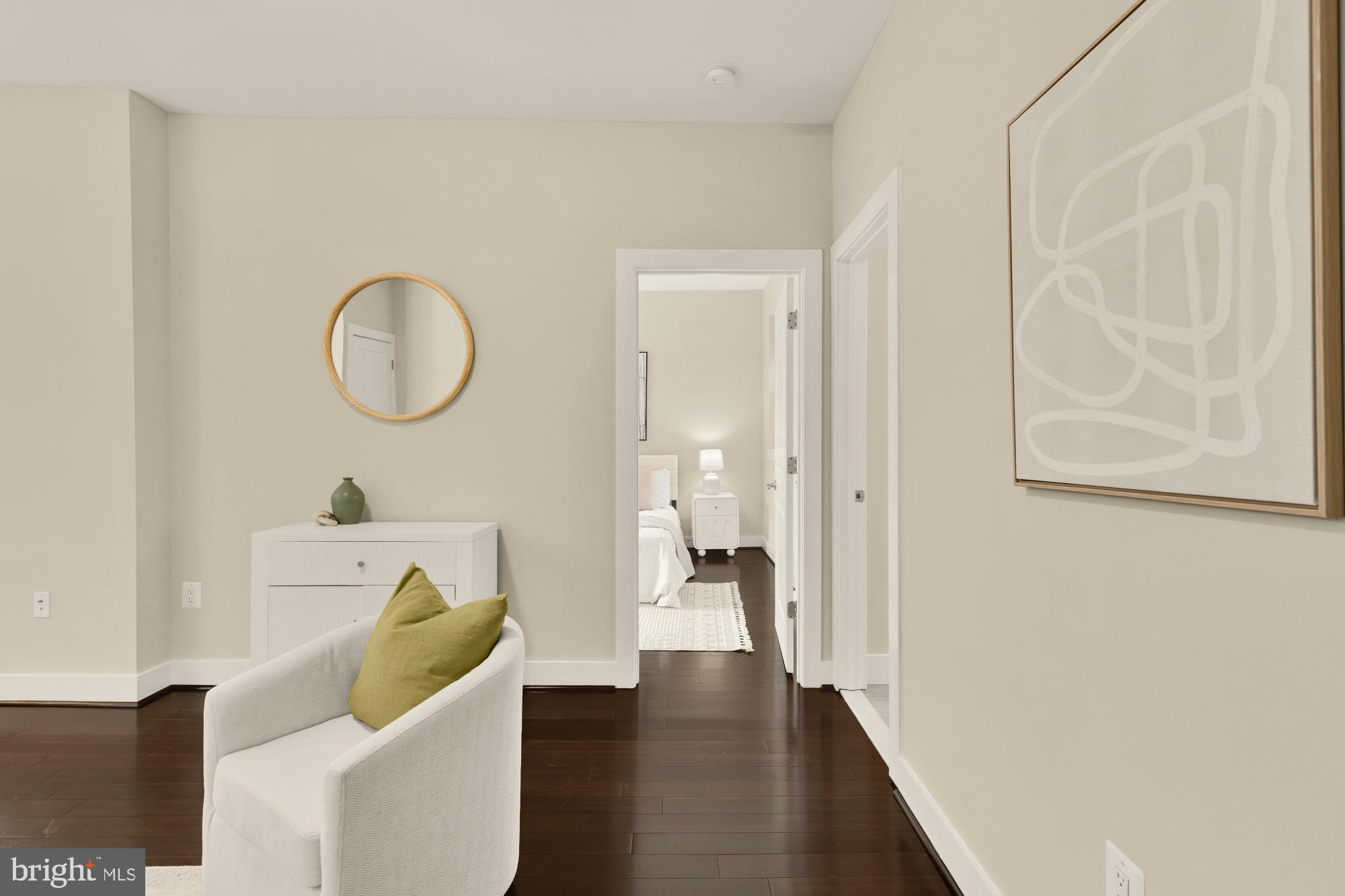 315 G Street Northeast, Unit 303 Washington, DC 20002 - Photo 8 of 16 a view of a livingroom with wooden floor and a staircase