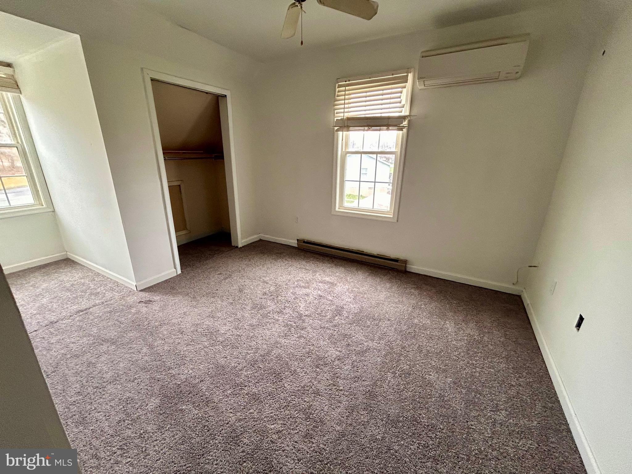208 Justice Way Elkton, MD 21921 - Photo 18 of 23 an empty room with windows