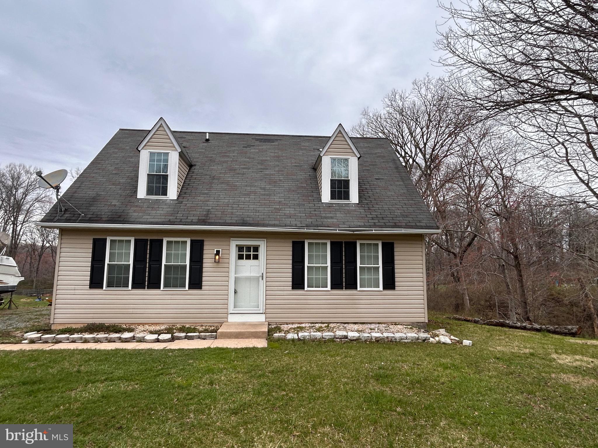 208 Justice Way Elkton, MD 21921 - Photo 2 of 23 a house that is sitting in the grass