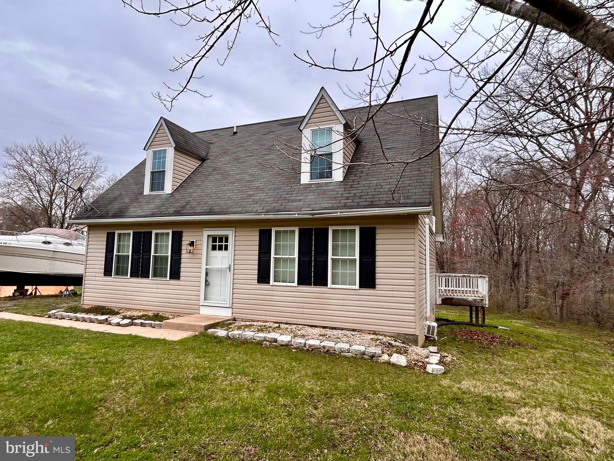 208 Justice Way Elkton, MD 21921 - Photo 3 of 23 a front view of a house with a yard