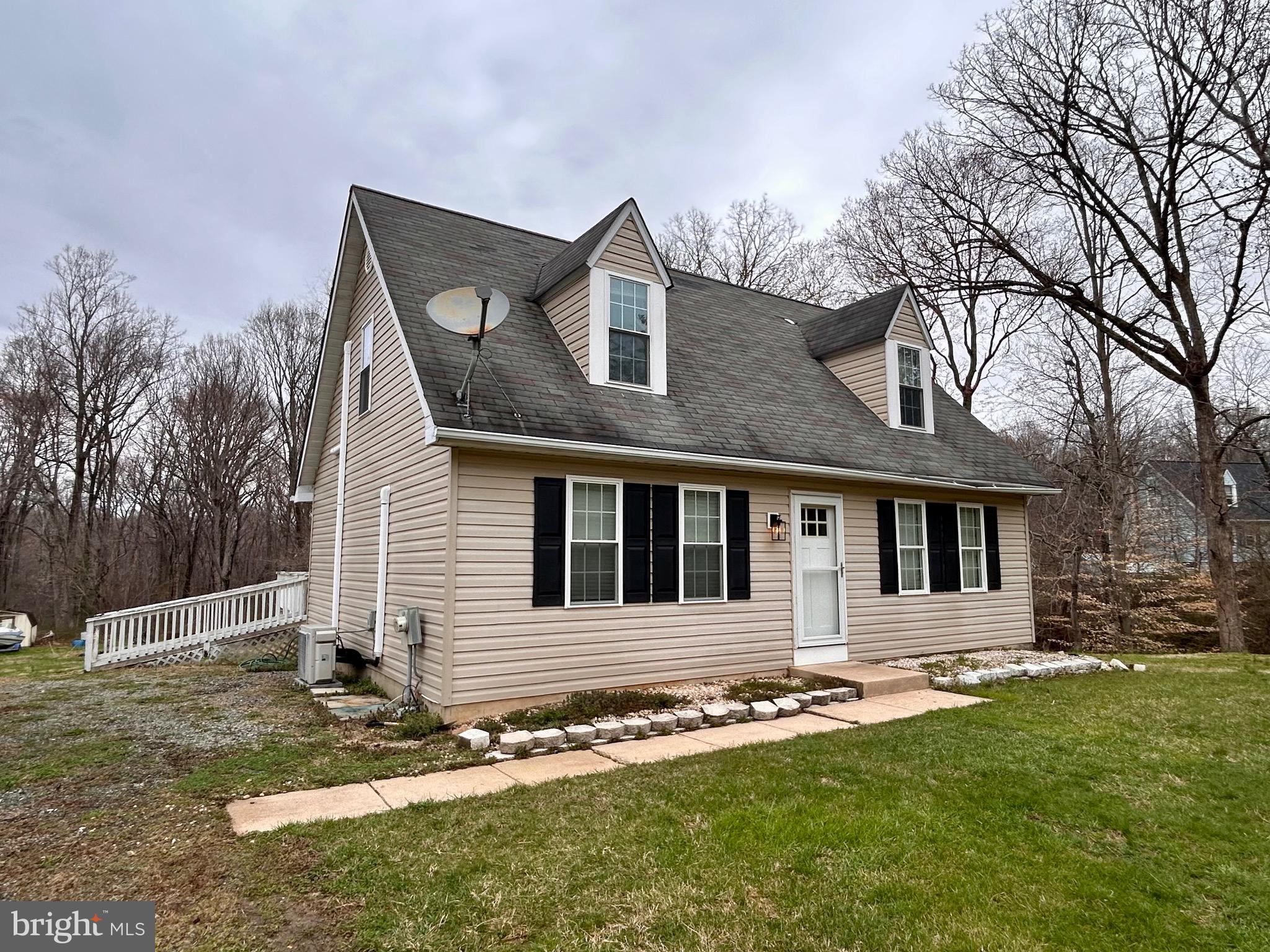 208 Justice Way Elkton, MD 21921 - Photo 4 of 23 front view of a house with a yard