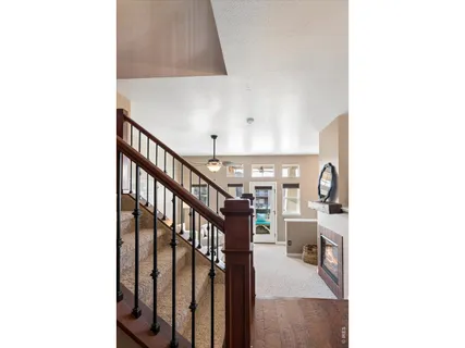a view of a hallway with seating area