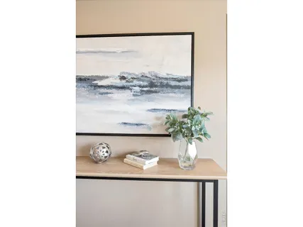 a vase of flowers sitting on a table