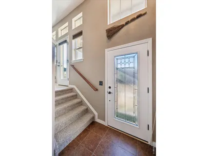 a view of an entryway with staircase