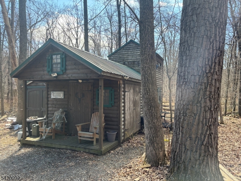 25 Red Mill Road Glen Gardner, NJ 08826 - Photo 2 of 9 a view of a house with backyard
