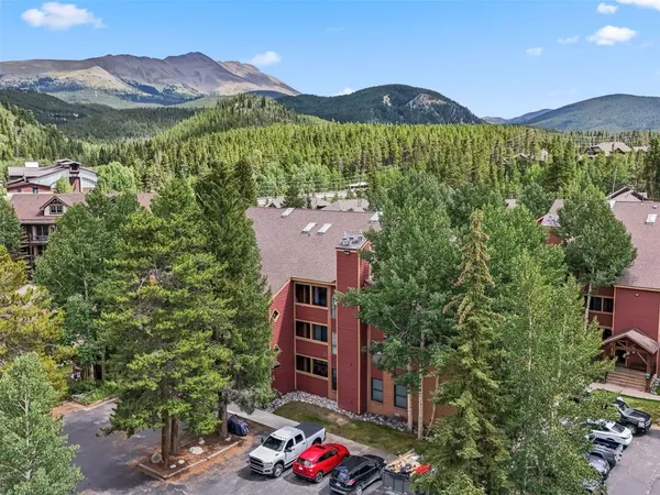an aerial view of residential houses and outdoor space