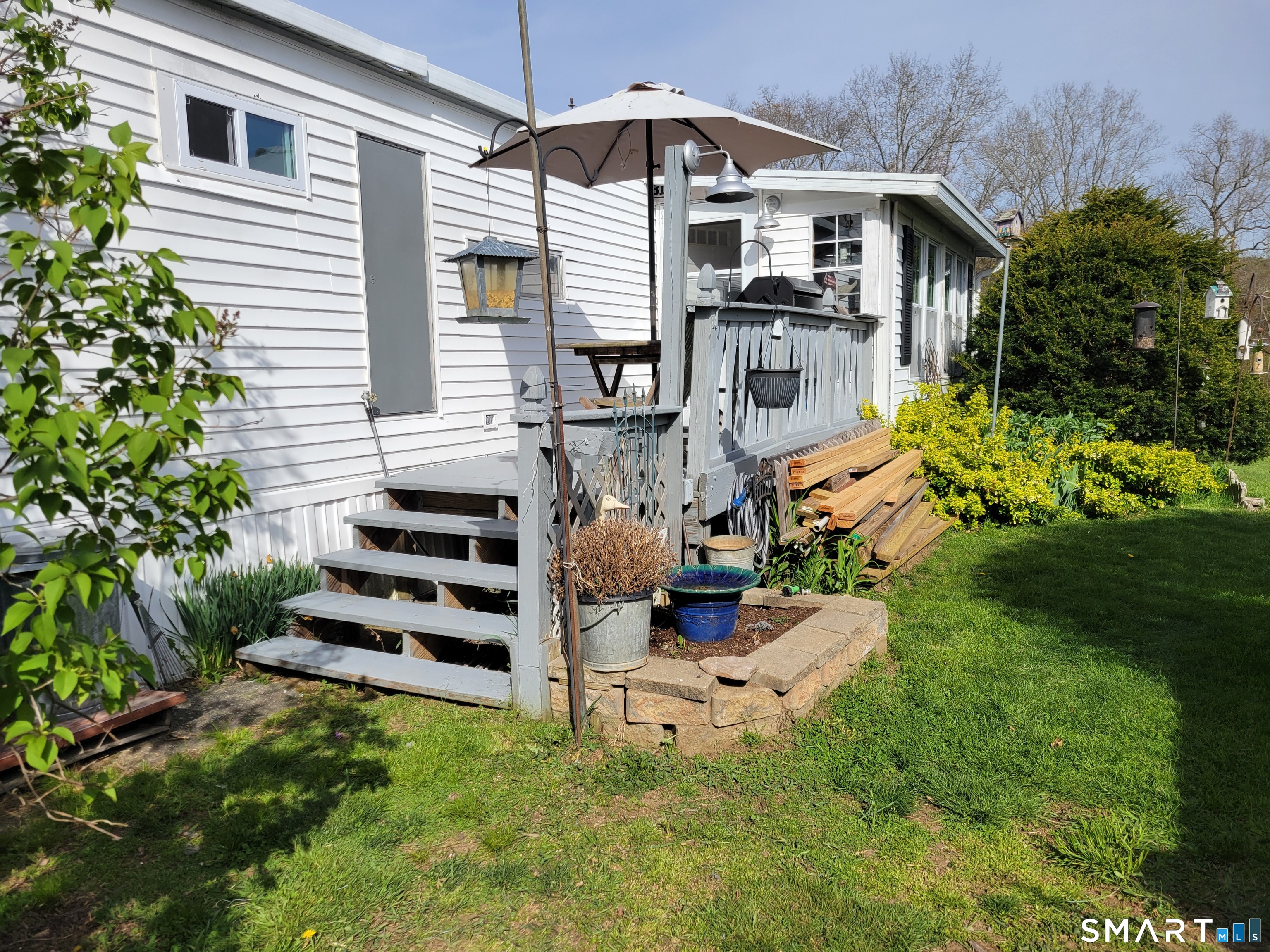 80 Sheldon Road Griswold, CT 06351 - Photo 4 of 12 a front view of a house with a yard