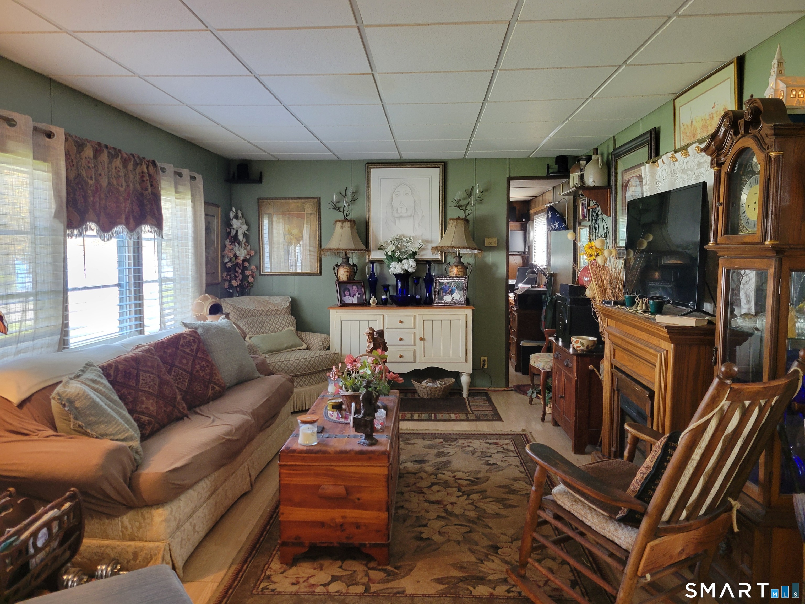 80 Sheldon Road Griswold, CT 06351 - Photo 6 of 12 a living room with furniture and a flat screen tv