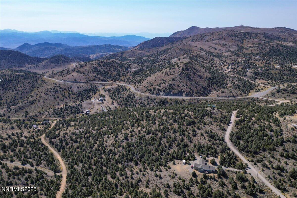 4760 Livery Road Reno, NV 89521 - Photo 18 of 41 a view of a lush green field