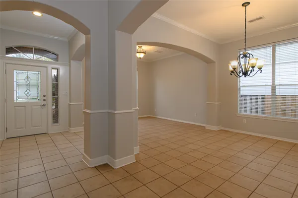 a large kitchen with stainless steel appliances granite countertop a stove a sink and a granite counter tops