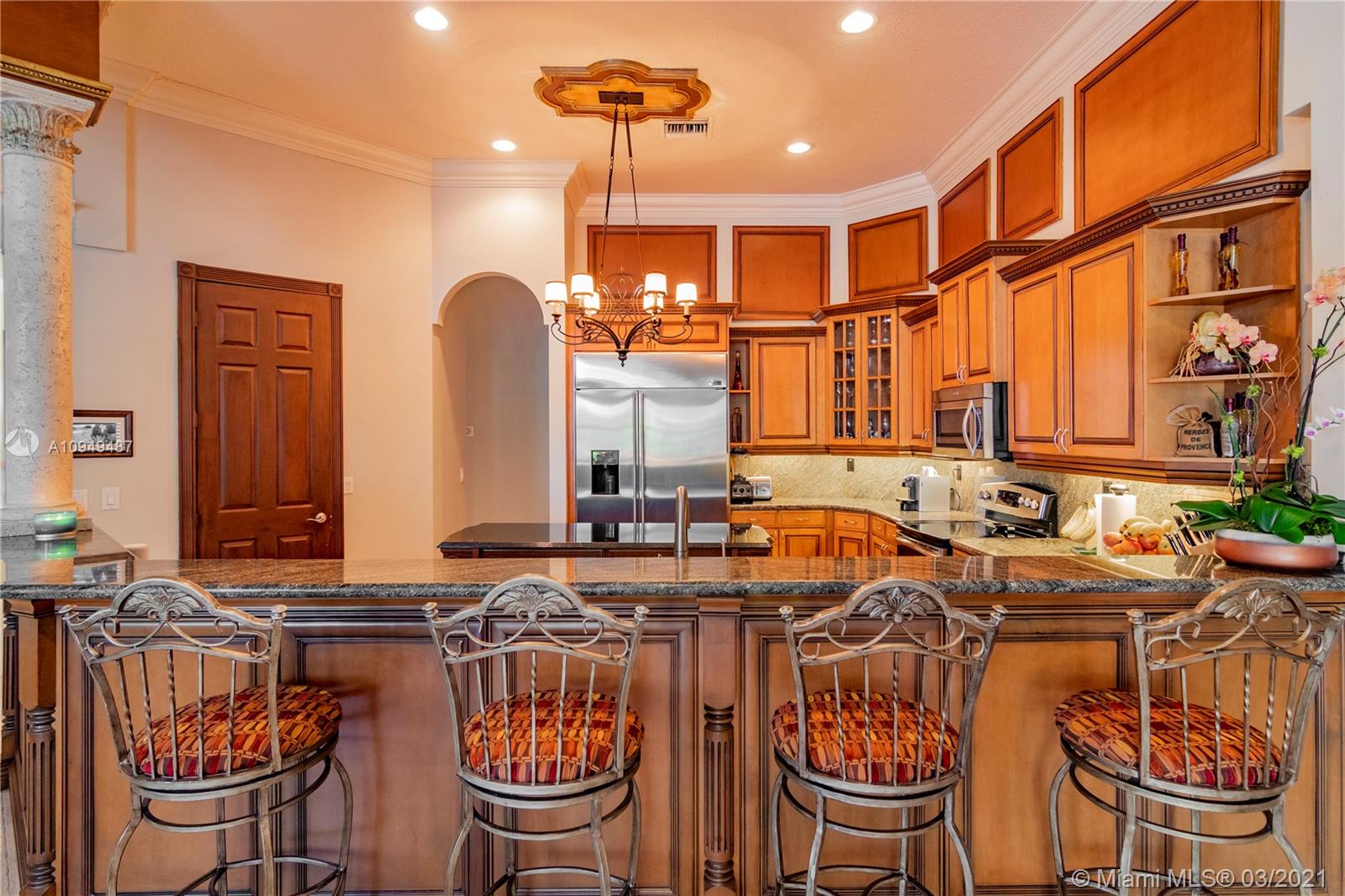 2273 Southwest 132nd Way Davie, FL 33325 - Photo 11 of 48 a very nice looking dining room with chairs and chandelier
