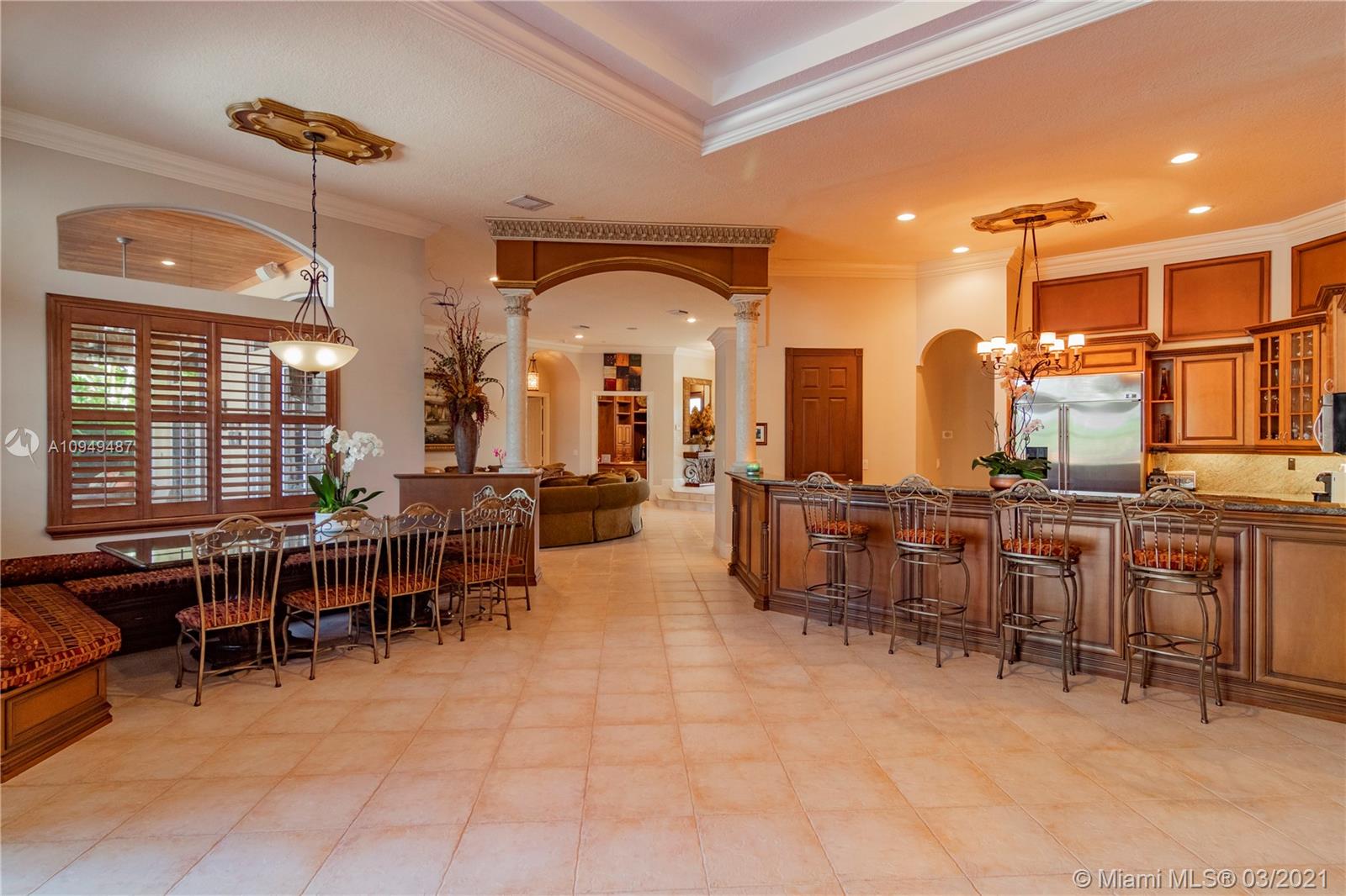 2273 Southwest 132nd Way Davie, FL 33325 - Photo 12 of 48 a view of a dining area with furniture