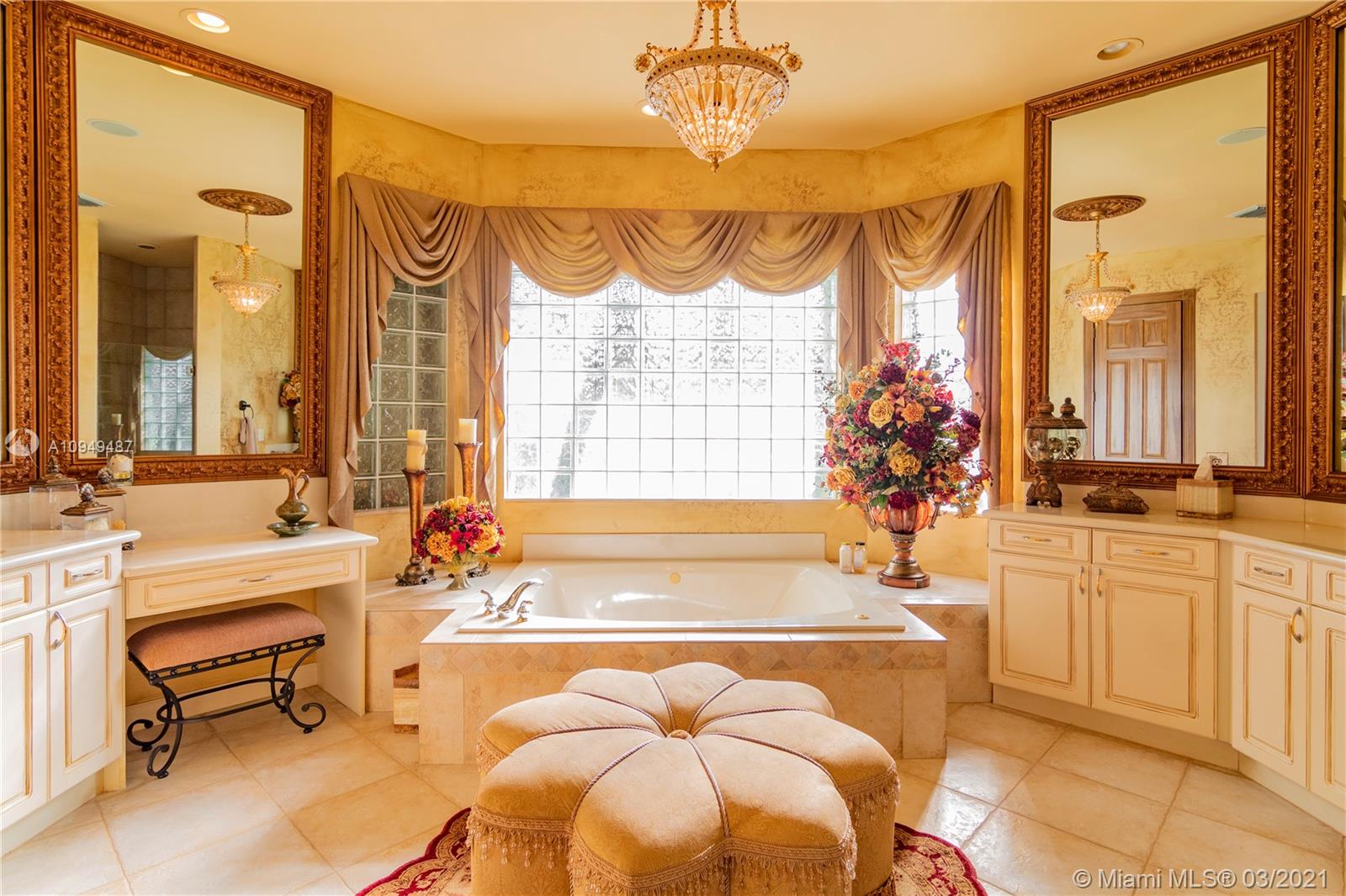 2273 Southwest 132nd Way Davie, FL 33325 - Photo 17 of 48 a spacious bathroom with a tub sink and mirror