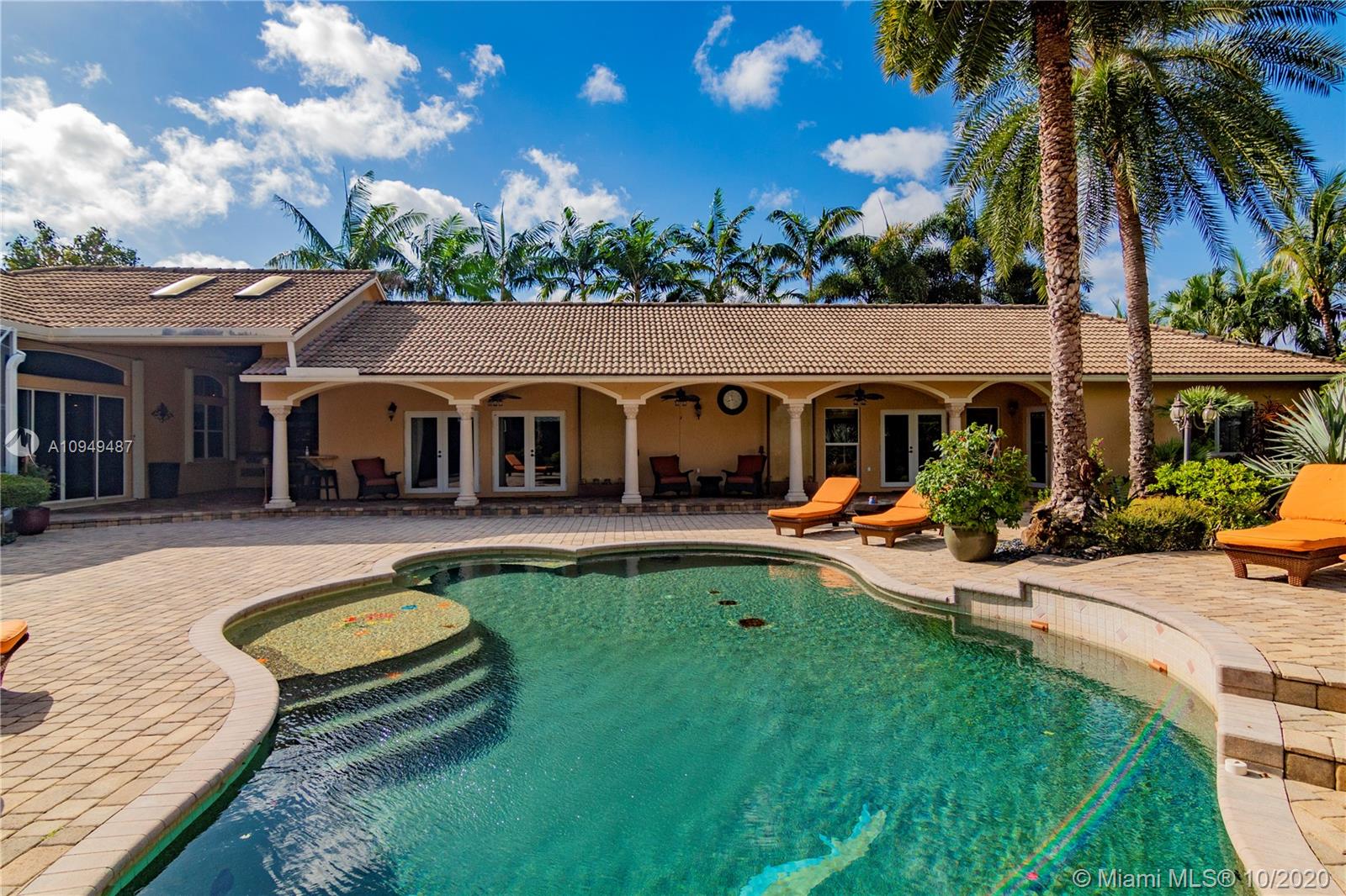 2273 Southwest 132nd Way Davie, FL 33325 - Photo 25 of 48 a view of a house with swimming pool and sitting area