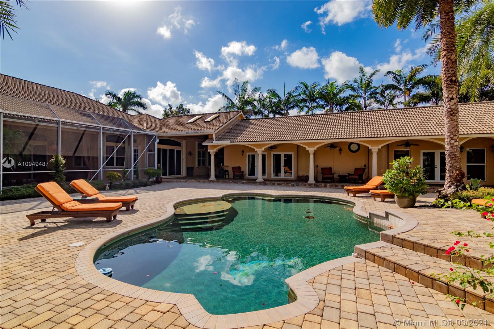 2273 Southwest 132nd Way Davie, FL 33325 - Photo 26 of 48 a view of a house with swimming pool and sitting area