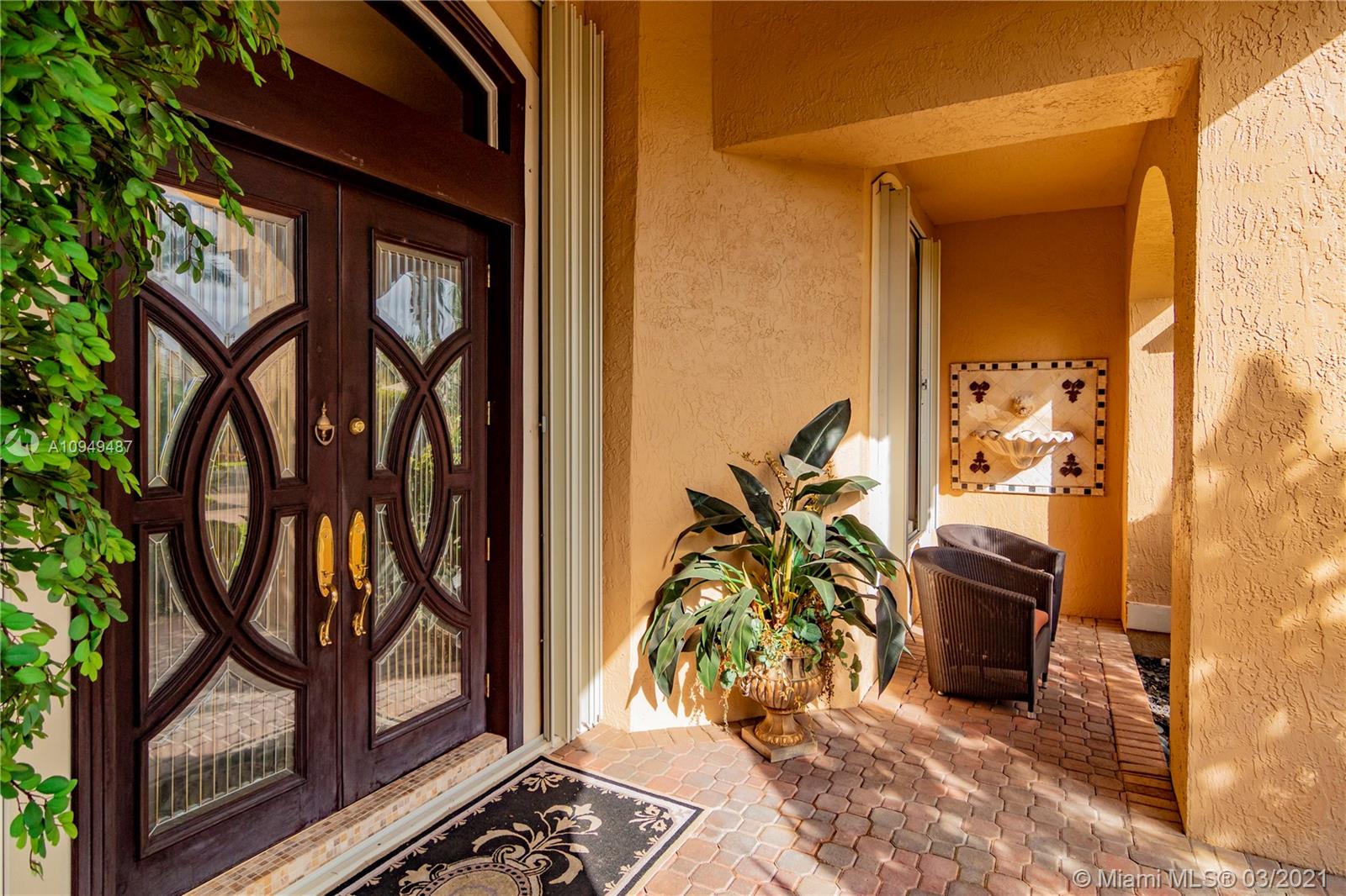 2273 Southwest 132nd Way Davie, FL 33325 - Photo 4 of 48 a view of a entryway door of the house
